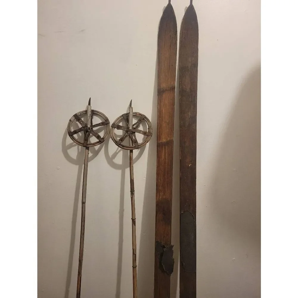 Antique Wooden Downhill skis‎ and ski poles.  Perfect for  Cabin or lodge decor